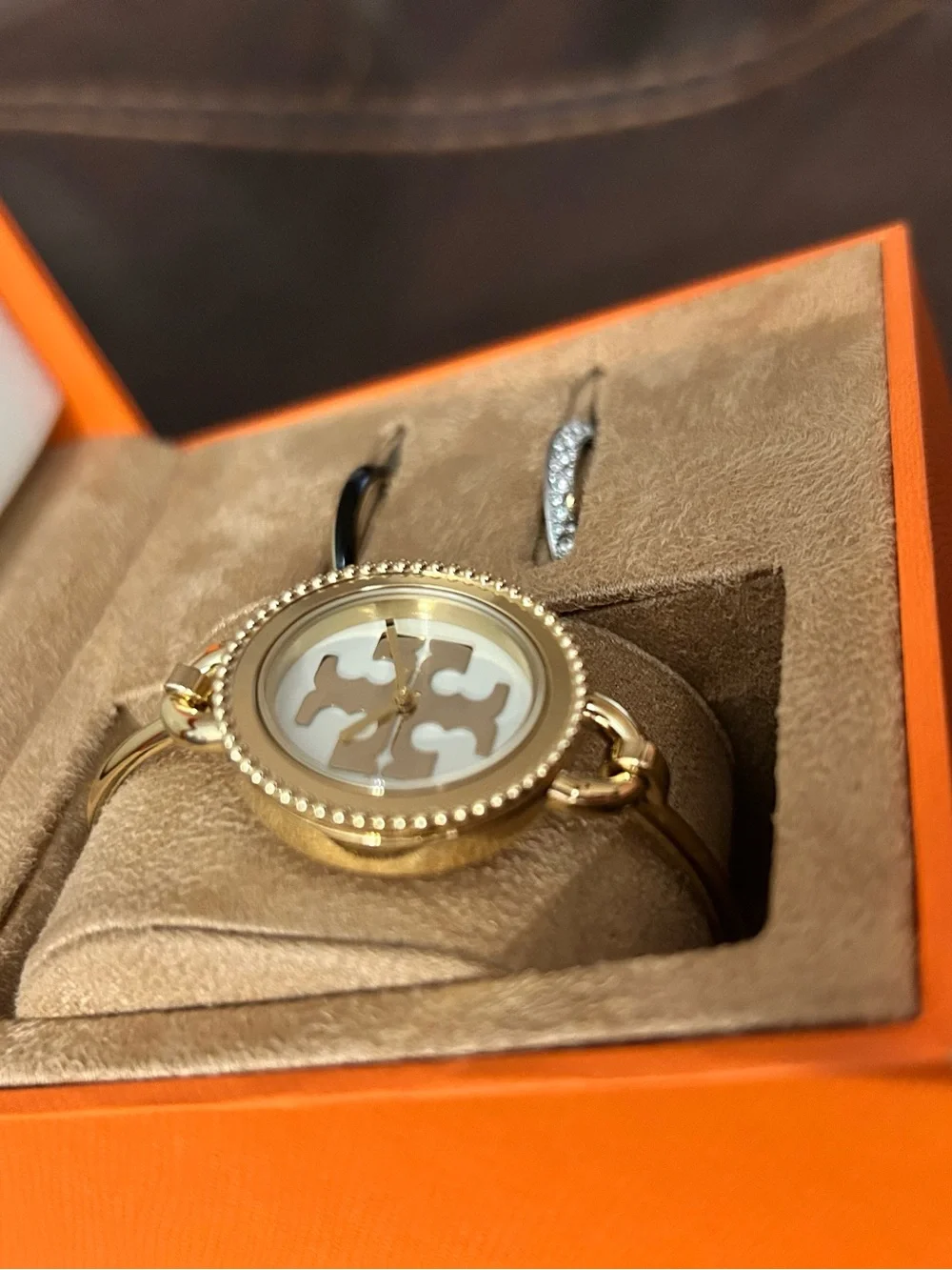 Tory Burch Gold-Tone Logo Dial Bangle Watch with White Face